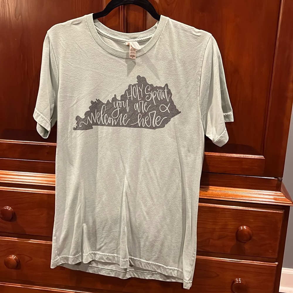 Size medium light green T-shirt